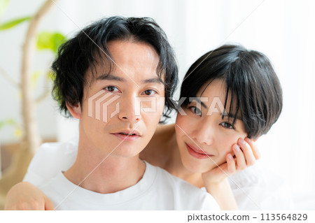 Beauty image of a young couple, close up of their faces Beauty image of a young couple, close up of their faces 113564829