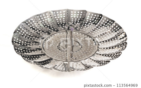 Old kitchen tool for boiling vegetables, place it in a pan with little water Old kitchen tool for boiling vegetables, place it in a pan with little water 113564969