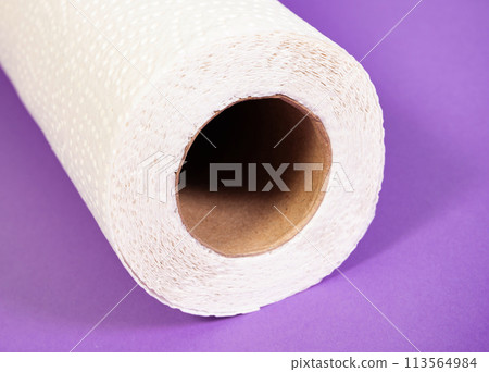 White kitchen paper isolated on purple background 113564984