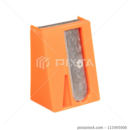 Old sharpner on white background, used in the kitchen for carrots Old sharpner on white background, used in the kitchen for carrots 113565000