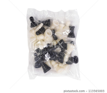 Plastic bag filled with simple chess pieces Plastic bag filled with simple chess pieces 113565003
