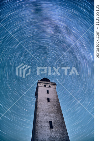 Rotating stars above Rubjerg Knude Fyr in northern Denmark 113565135