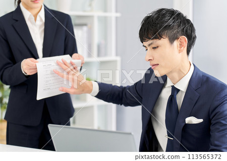 Businessman refusing to work in an intimidating manner 113565372