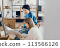 Young woman receiving counseling at a beauty salon 113566126