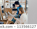 Young woman receiving counseling at a beauty salon 113566127