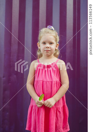 Outdoor portrait of serious sad little caucasian child girl look at camera, unhappy small child kid feel lonely abandoned, outcast or loner miss parents, children drama Outdoor portrait of serious sad little caucasian child girl look at camera, unhappy small child kid feel lonely abandoned, outcast or loner miss parents, children drama 113566149