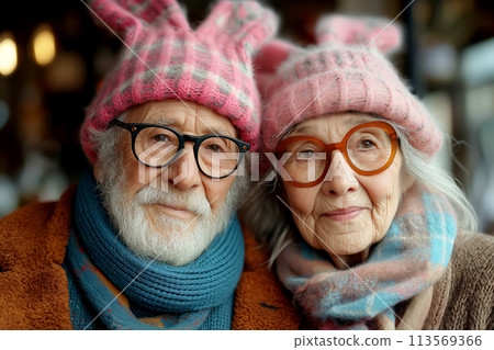 Happy old couple in bunny ears on festive background. Easter concept 113569366