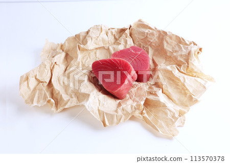 Piece of tuna on white background. natural omega. Isolated object. 113570378