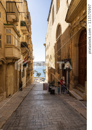 The narrow streets in the center of Valletta, Malta 113570997