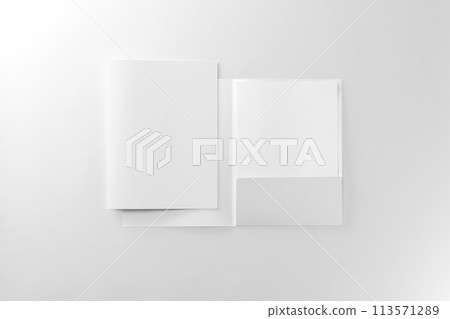 Corporate stationery set mockup. Two presentation folders and letterhead at white textured paper background. Corporate stationery set mockup. Two presentation folders and letterhead at white textured paper background. 113571289