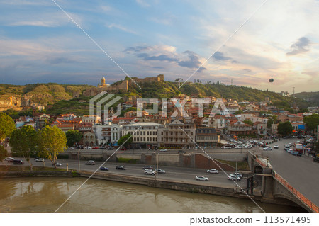 Beautiful panoramic landscape of old city in Tbilisi with green mountains 113571495