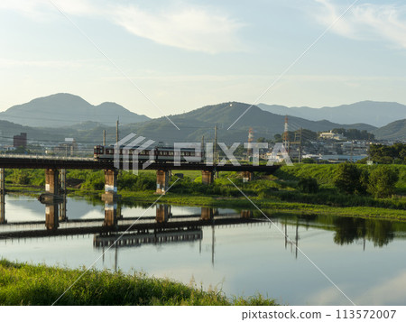 Kintetsu Myoji Line train crossing the Yamato River 113572007