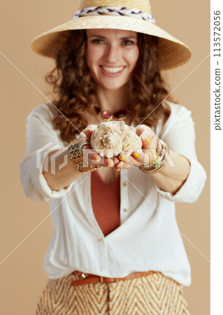 happy trendy woman in blouse and shorts happy trendy woman in blouse and shorts 113572056