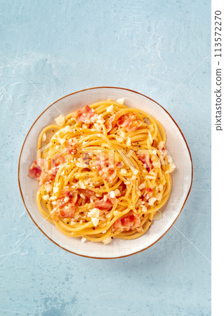Carbonara pasta dish, traditional spaghetti with pancetta and cheese Carbonara pasta dish, traditional spaghetti with pancetta and cheese 113572270