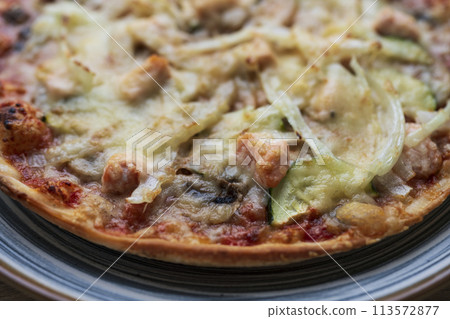 Italian homemade pizza with salmon Italian homemade pizza with salmon 113572877