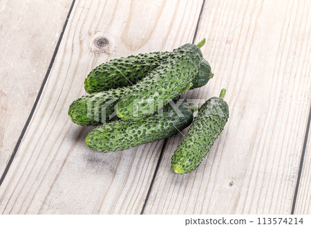 Fresh natural organic cucumbers heap Fresh natural organic cucumbers heap 113574214