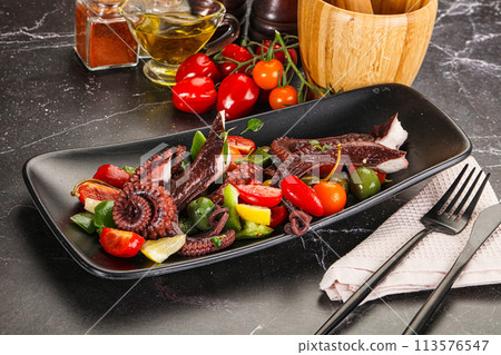 Salad with octopus tentacle and vegetables 113576547