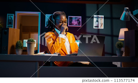 African american girl listening to professor debating latest lesson, taking notes after understanding explanations. Student participating at online school classes on academic platform. Camera B. African american girl listening to professor debating latest lesson, taking notes after understanding explanations. Student participating at online school classes on academic platform. Camera B. 113577174