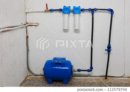 Residential water cleaning system using string wound polypropylene sediment filter cartridges. 113579749