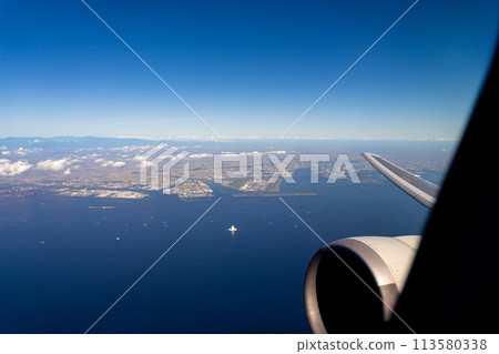 Airport airplane Haneda Airport takeoff morning noon bright airline engine brake terminal aerial view 113580338