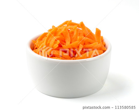 Grated carrots isolated on white Grated carrots isolated on white 113580585