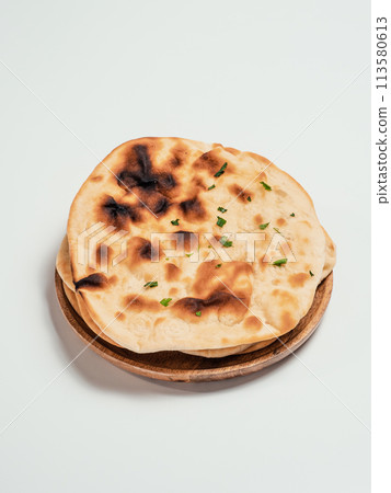 naan flatbreads isolated on white background naan flatbreads isolated on white background 113580613