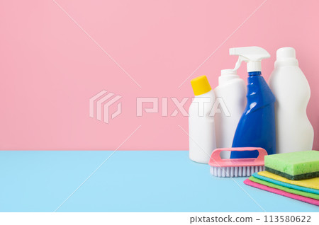 House cleaning product on blue pink bg, copy space House cleaning product on blue pink bg, copy space 113580622