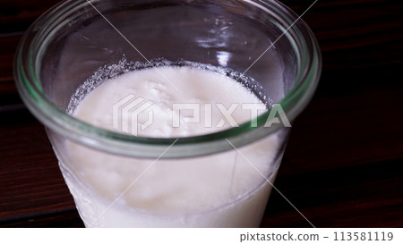 Wooden table and homemade yogurt 113581119