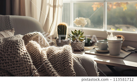 a warm and inviting home office bathed in soft, natural light 113581712