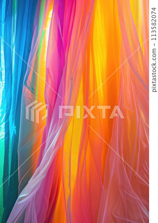 Cascading waves of neon fabric in vivid orange, pink, and blue 113582074
