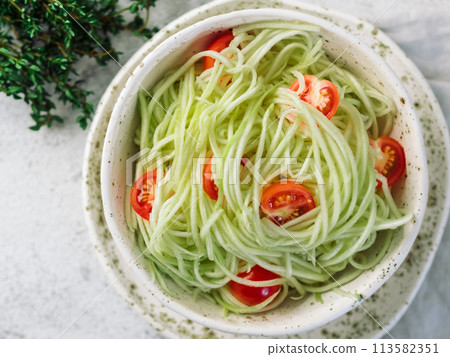 Zucchini noodles salad. Top view, copy space Zucchini noodles salad. Top view, copy space 113582351