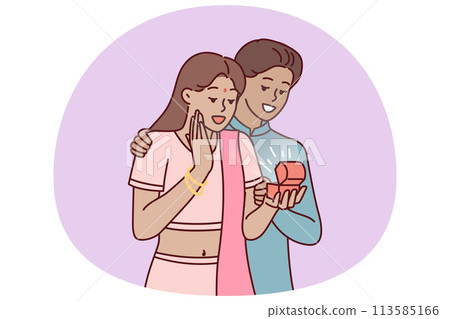 Indian man surprises wife with box of jewelry or engagement ring as token of love and devotion Indian man surprises wife with box of jewelry or engagement ring as token of love and devotion 113585166
