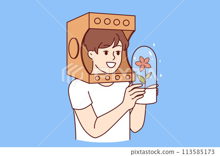 Child in paper astronaut helmet dreams of flying into space on shuttle, holding flask with plant 113585173