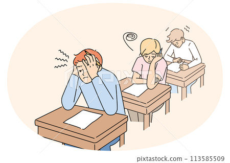 Anxious students write test in classroom 113585509
