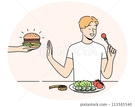 Smiling man eat salad refuse from burger Smiling man eat salad refuse from burger 113585540