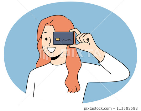 Smiling woman with credit card in hands 113585588