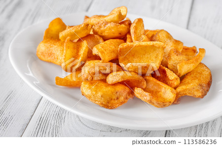 Portion of potato dippers Portion of potato dippers 113586236