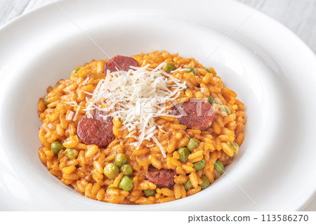 Portion of chorizo risotto 113586270