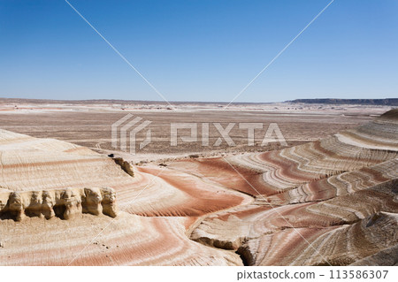 Kyzylkup plateau landscape, Mangystau desert. Rock strata formations Kyzylkup plateau landscape, Mangystau desert. Rock strata formations 113586307
