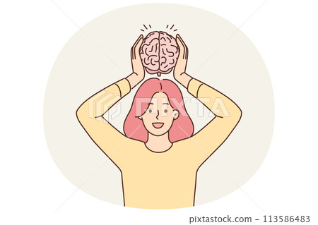 Smiling woman hold brain model 113586483