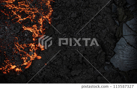 Aerial view of the texture of a solidifying lava field Aerial view of the texture of a solidifying lava field 113587327
