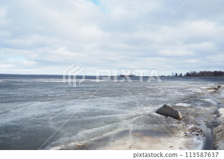 Ice drift in spring on Lake Onega, Karelia. Dangerous thin spring ice in April. Aggregate accumulations of fine-crystalline grains. Opening of small lakes, ponds and reservoirs. Crushed ice floes Ice drift in spring on Lake Onega, Karelia. Dangerous thin spring ice in April. Aggregate accumulations of fine-crystalline grains. Opening of small lakes, ponds and reservoirs. Crushed ice floes 113587637