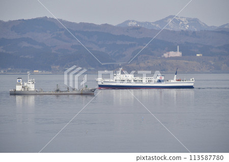 Spring scenery of the Tsugaru Kaikyo Ferry sailing through Hakodate Bay in Hakodate, Hokkaido Spring scenery of the Tsugaru Kaikyo Ferry sailing through Hakodate Bay in Hakodate, Hokkaido 113587780