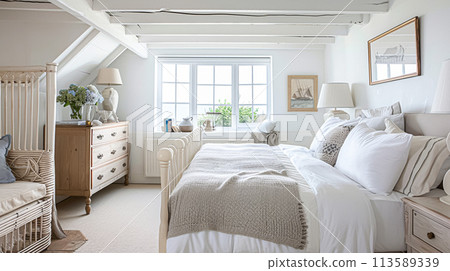 Beautiful interior of luxury bedroom with window sea view. Coastal cottage concept 113589339