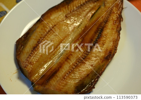 Dried Atka mackerel with golden brown grill marks 113590373