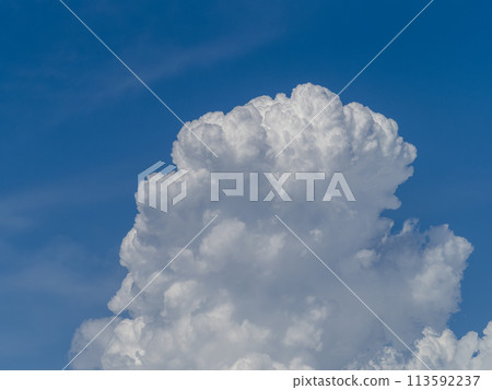 A summer sky with cumulonimbus clouds rising 113592237