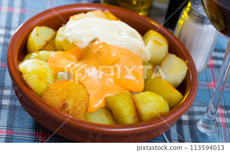 Patatas Bravas - traditional Spanish snack Patatas Bravas - traditional Spanish snack 113594013
