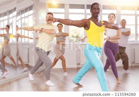 Group of people dancing jazz funk Group of people dancing jazz funk 113594260