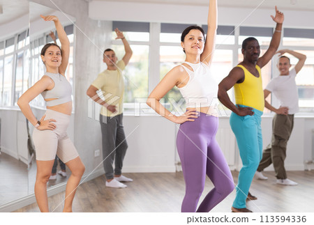 Group of people dancing modern dances 113594336