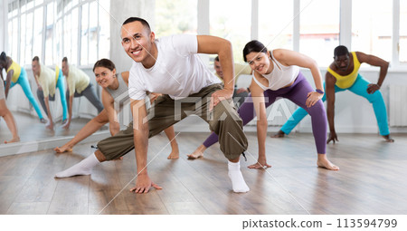 Young Asian man practicing aerobic dance in training hall 113594799